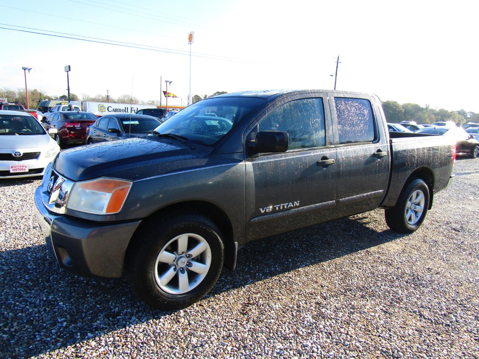 2011 Gray Nissan Titan S Crew Cab 2WD (1N6AA0EKXBN) with an 5.6L V8 DOHC 32V engine, Automatic transmission, located at 15016 S Hwy 231, Midland City, AL, 36350, (334) 983-3001, 31.306210, -85.495277 - Photo #2